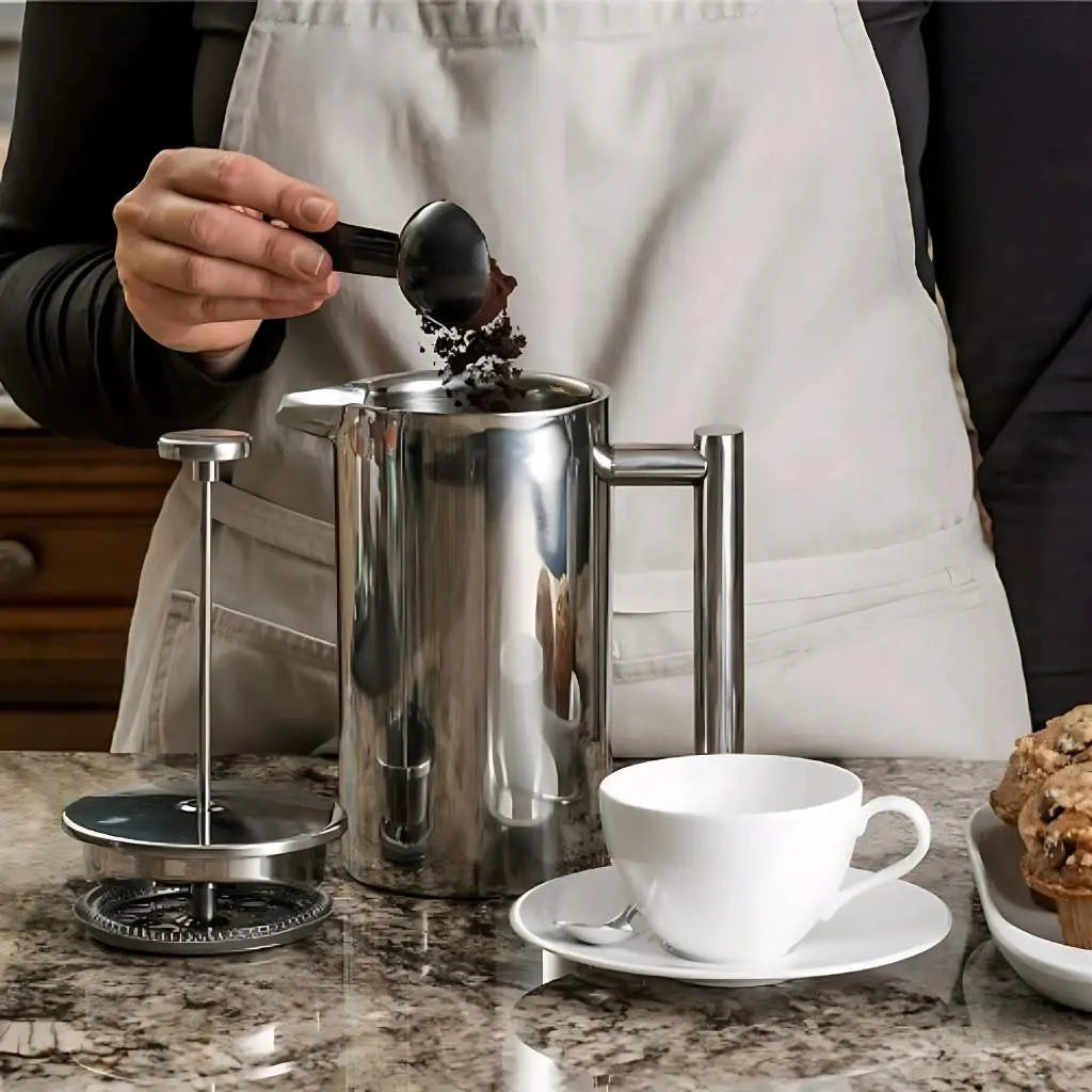 Stainless steel french press with double wall insulation and precision filter for coffee brewing