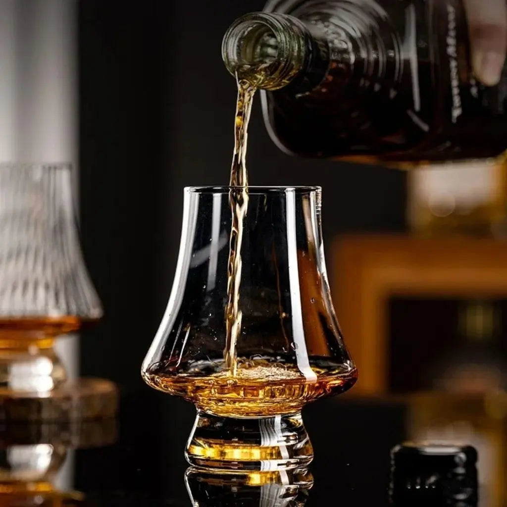 Curved crystal whiskey glass designed for tasting fine spirits, brandy, and whiskey at home