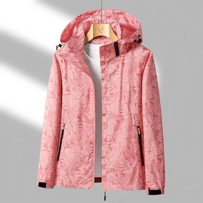 Women's Lightweight Waterproof Outdoor Jacket with Adjustable Hood and Zippered Pockets 1