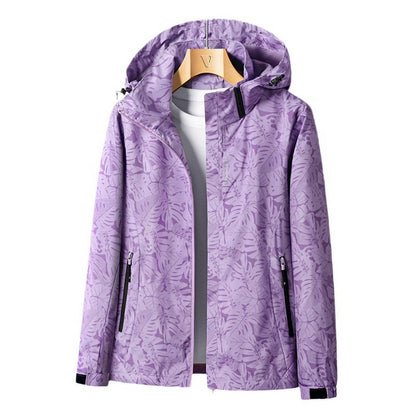 Women's Lightweight Waterproof Outdoor Jacket with Adjustable Hood and Zippered Pockets 2