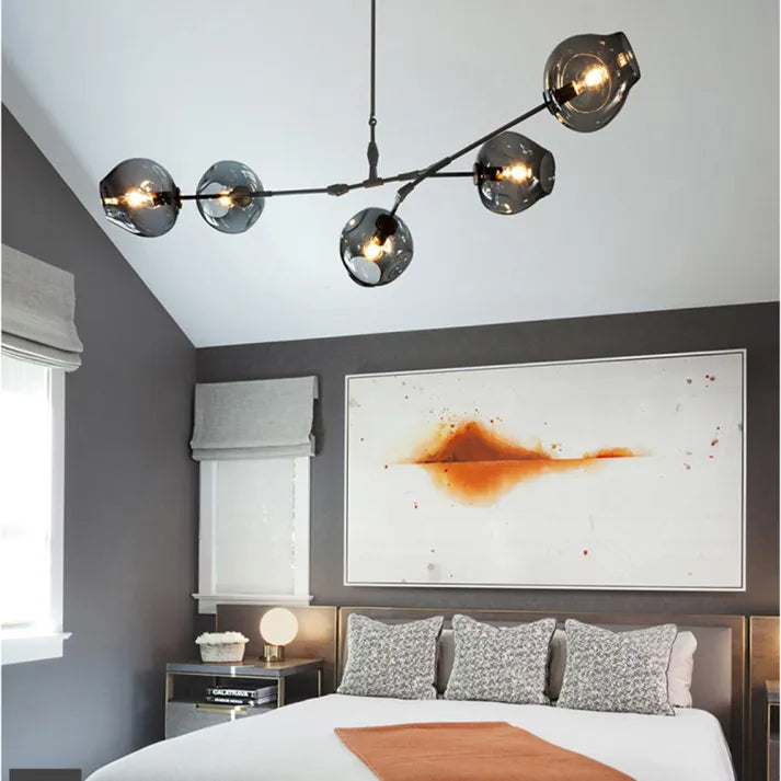 Sleek Glass Pendant Light With Modern Branching Arms