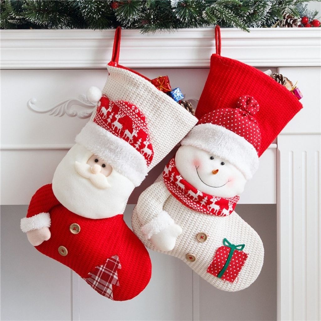 Handmade knitted stocking with visible yarn texture and hanging loop