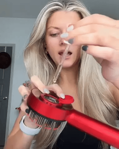 Rejuvenating Scalp Massager With LED Light And Variable Speeds