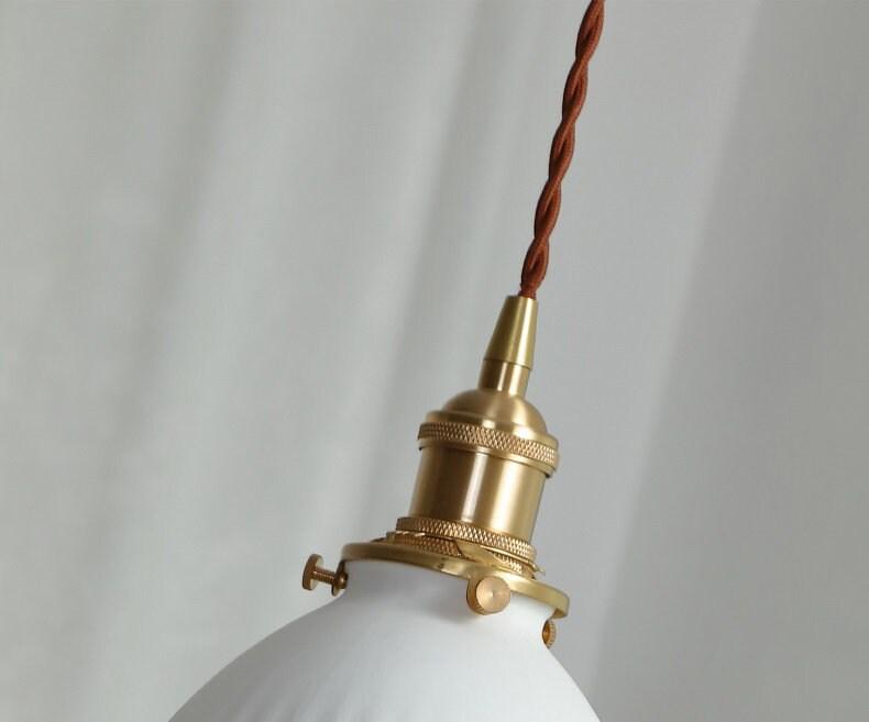 Stylish Ceramic Pendant LED Light with Unique Shade