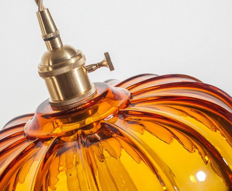 Elegant Glass Pendant Light with Brass Fitting and Bulb