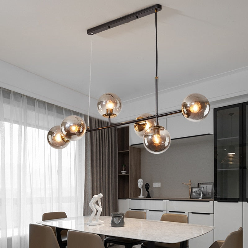 Warm Amber Glass Hanging Lamp with Metal Accents