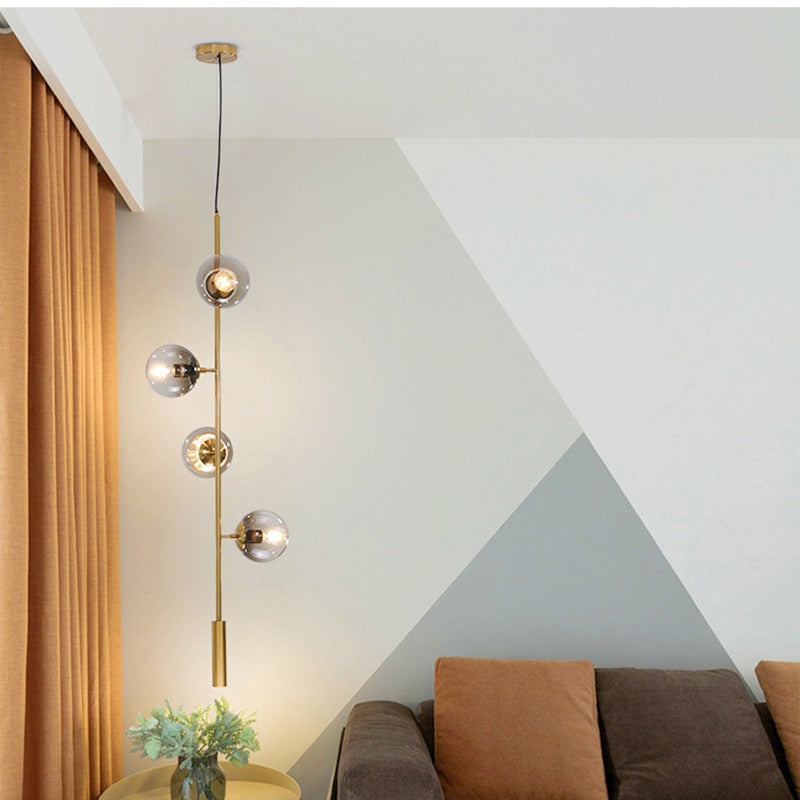 Warm Amber Glass Hanging Lamp with Metal Accents