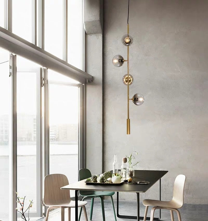 Warm Amber Glass Hanging Lamp with Metal Accents