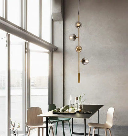 Warm Amber Glass Hanging Lamp with Metal Accents
