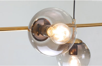 Warm Amber Glass Hanging Lamp with Metal Accents