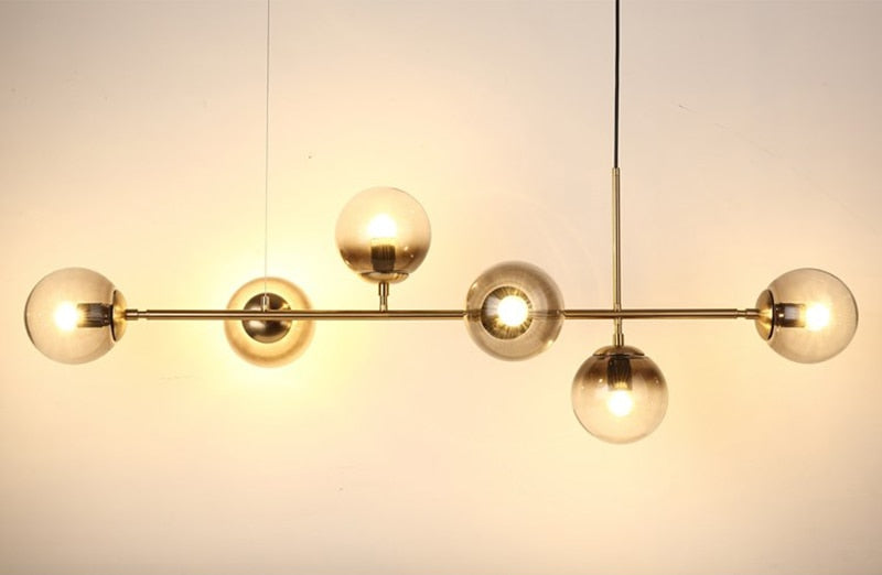 Warm Amber Glass Hanging Lamp with Metal Accents