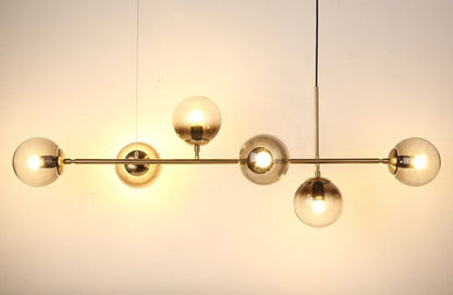 Warm Amber Glass Hanging Lamp with Metal Accents