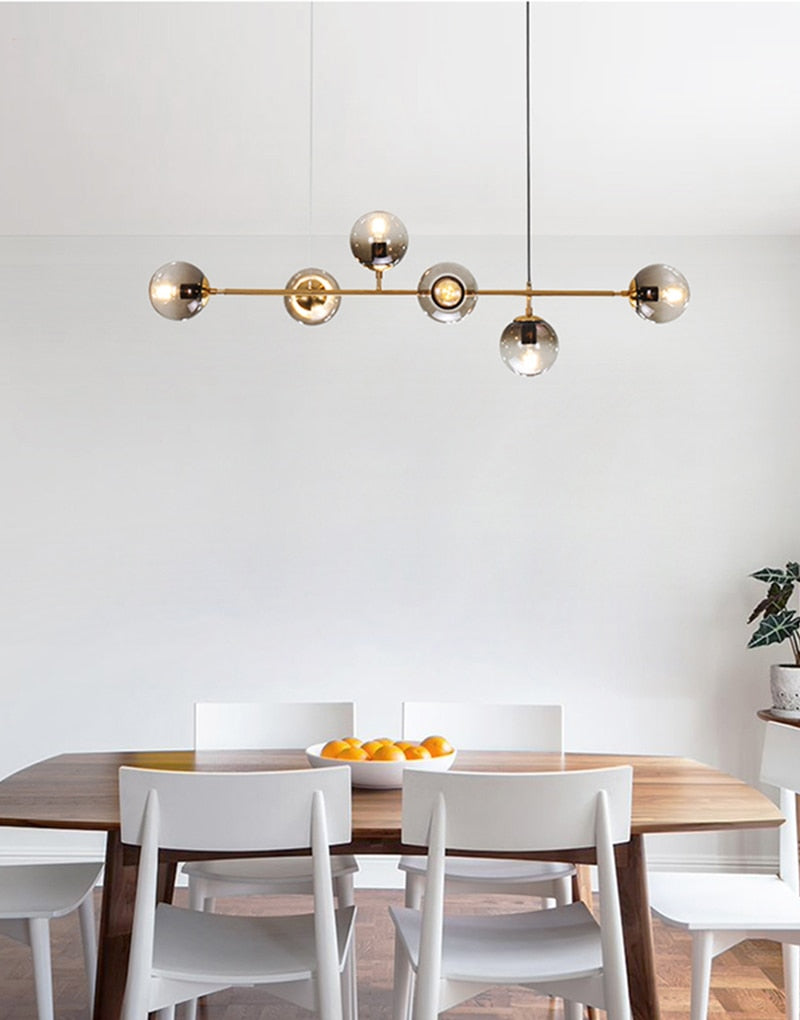 Warm Amber Glass Hanging Lamp with Metal Accents