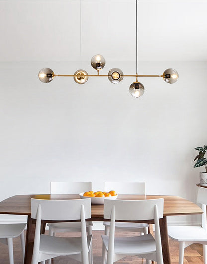 Warm Amber Glass Hanging Lamp with Metal Accents