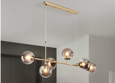 Warm Amber Glass Hanging Lamp with Metal Accents